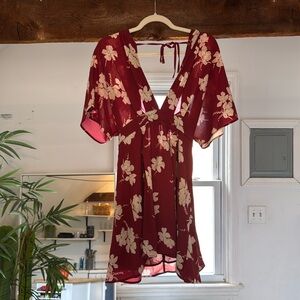 Burgundy floral Romper! Very comfortable and has a low back